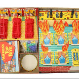 Vintage toy set with fire engine, building model, and accessories on a white background