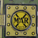 Vintage toy part with 'MAR Toys' logo on a white background