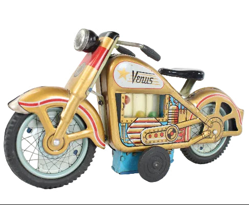 Toy motorcycle with 'Venus' branding on a white background