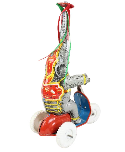 Colorful toy elephant with mechanical parts on a white background