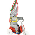 Toy elephant with a rider on a white background