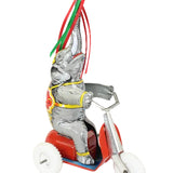 Toy elephant with a rider on a white background