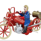 Model of a vintage fire engine with a figure on a white background