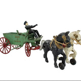 Toy figure of a man in a green cart pulled by two horses on a white background