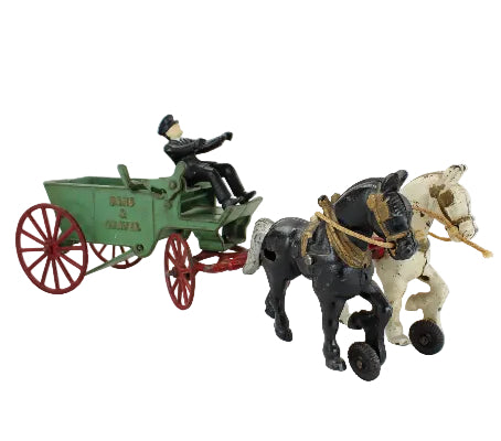 Toy figure of a man in a green cart pulled by two horses on a white background