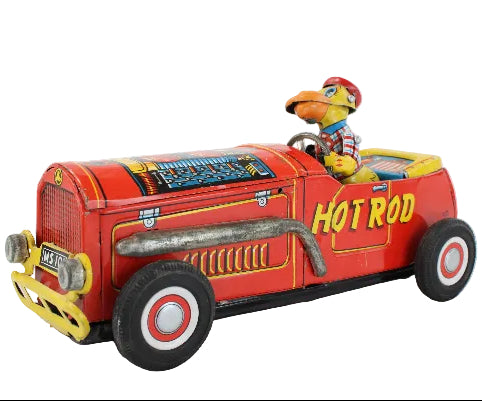 Toy car with a character inside on a white background