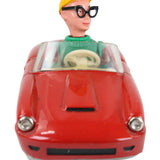 Toy figure of a character with a red vehicle body on a white background