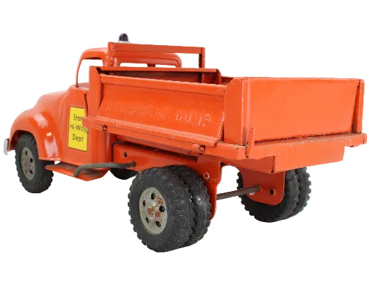 Orange toy truck with a flatbed on a white background