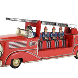 Red toy fire truck with figures on a white background