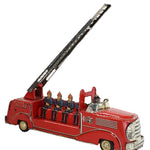 Red toy fire truck with a crane on a white background
