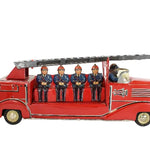 Red toy fire truck with figures on a white background