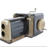 Vintage camera with a metallic finish on a white background