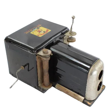 Vintage black and silver projector on a white background