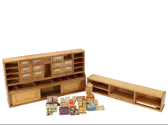 Wooden toy furniture set on a white background