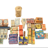 Collection of vintage boxes and a wooden can on a white background