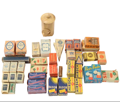 Collection of vintage boxes and a wooden can on a white background