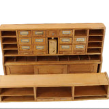 Wooden storage unit with multiple compartments on a white background