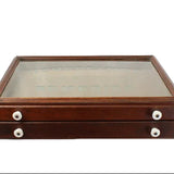 Wooden display case with glass top on a white background