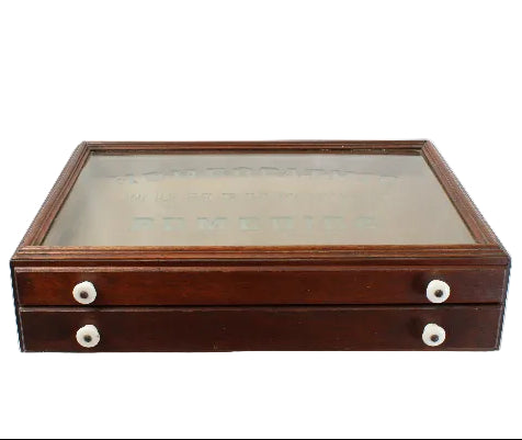Wooden display case with glass top on a white background