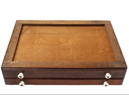 Wooden box with two drawers on a white background
