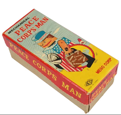 Box for a mechanical toy 'Peace Corps Man' with colorful design on a white background