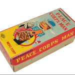 Box for a mechanical toy 'Peace Corps Man' by Mego Corp on a white background