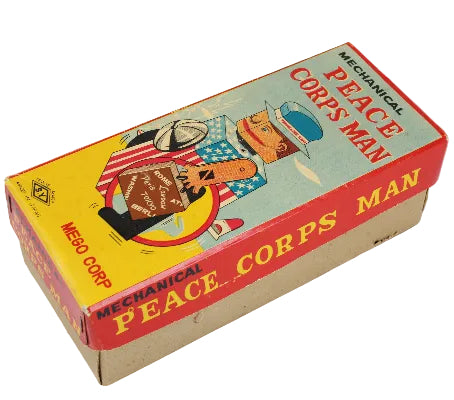 Box for a mechanical toy 'Peace Corps Man' by Mego Corp on a white background