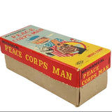 Vintage box for a mechanical Peace Corps Man toy on a white background