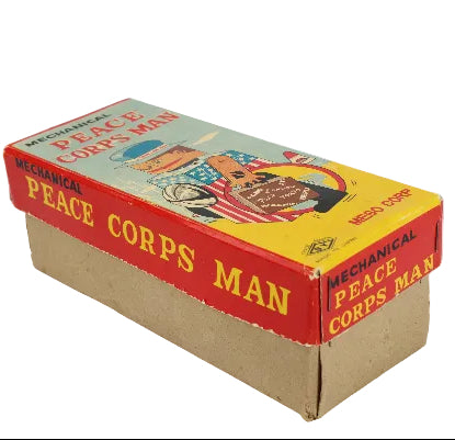 Vintage box for a mechanical Peace Corps Man toy on a white background