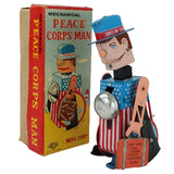 Mechanical Peace Corps Man toy with its box on a white background