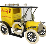 Model of a vintage truck with Coca-Cola branding on a white background