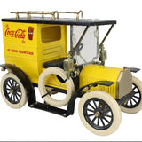 Model of a vintage truck with Coca-Cola branding on a white background