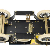 Model car chassis with wheels and visible branding on a white background