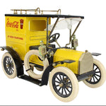 Model of a vintage truck with Coca-Cola branding on a white background