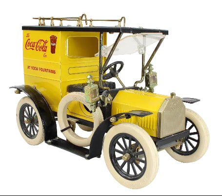 Model of a vintage truck with Coca-Cola branding on a white background