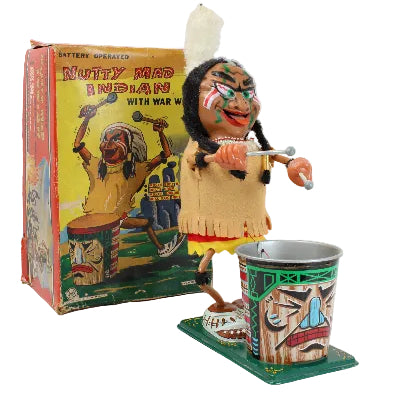 Vintage toy figure of a Native American chief on a box with colorful illustrations.
