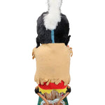 Toy figure of a person in a traditional outfit with a colorful background on a black background