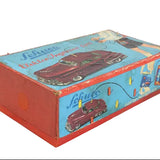 Vintage toy car box with colorful graphics on a white background