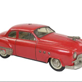 Model of a classic red car on a white background