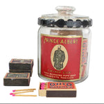 Jar labeled 'Prince Albert' with a vintage tobacco advertisement, surrounded by matches on a white background.