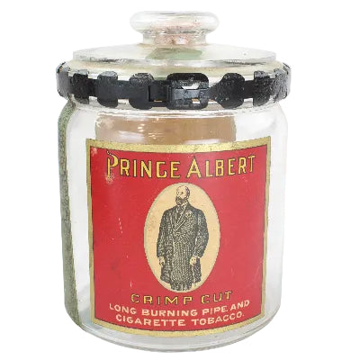 Vintage Prince Albert cigarette jar with red label on a white background