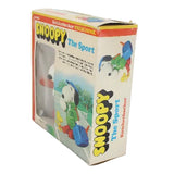 Vintage Snoopy toy packaging on a white background
