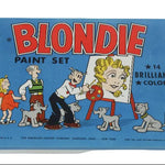 Blondie comic strip paint set packaging with characters and '14 Brilliant Colors' text on a blue background.