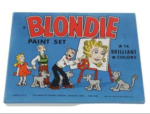 Blondie comic strip paint set packaging with characters and '14 Brilliant Colors' text on a blue background.