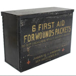 Vintage Johnson & Johnson first aid box with text on a white background