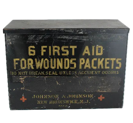 Vintage Johnson & Johnson first aid kit box on a white background