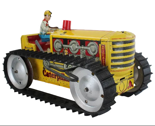 Toy Caterpillar tractor with a driver figure on a white background