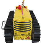 Yellow toy bulldozer with black tracks on a white background