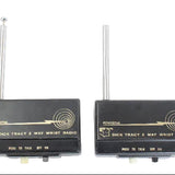 Two Dick Tracy 2-way wrist radios on a white background