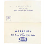 Warranty card for Dick Tracy 2 Way Wrist Radio on a light blue background